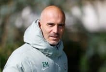 Male coach outdoors wearing sports jacket, sports training, fitness coaching, athletic training session, ZareSport.et sports apparel.