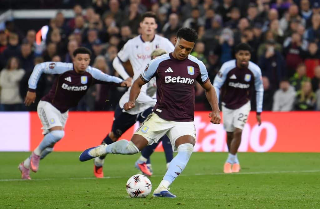 Far from Perfect – but Villa’s Europa League Journey Begins Vibrant soccer match featuring Aston Villa players in maroon jerseys competing on the field with a lively crowd background.