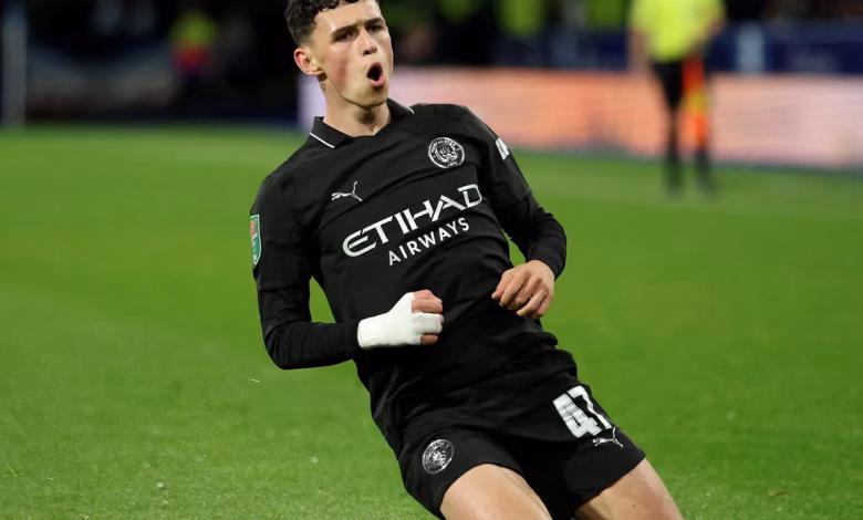 Huddersfield Fight Hard, But City Too Strong