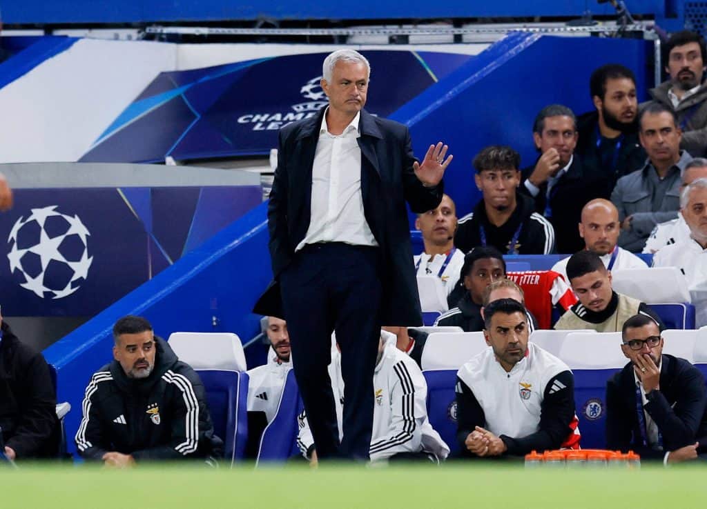 Richarlison during match at UEFA Champions League, football coach at sideline, professional soccer team in stadium, sporting event, cheering fans.