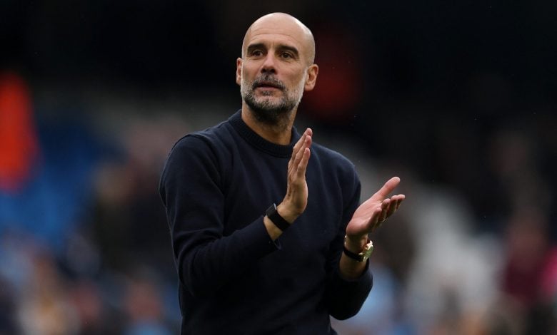 Super Sunday: Drama Awaits in the Premier League Dynamic sports coach clapping during a match emphasizing motivation and leadership at a sports event.