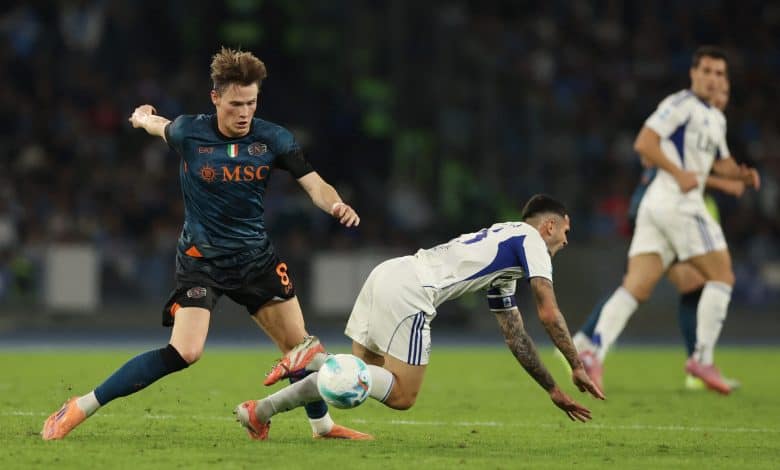 Dynamic soccer players competing for the ball during a match, showcasing competitive sports action and athletic skill.