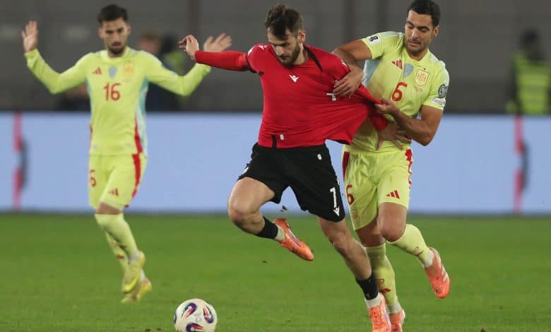 Intense soccer match with players competing fiercely for the ball on the field, showcasing teamwork and athleticism during a professional game.