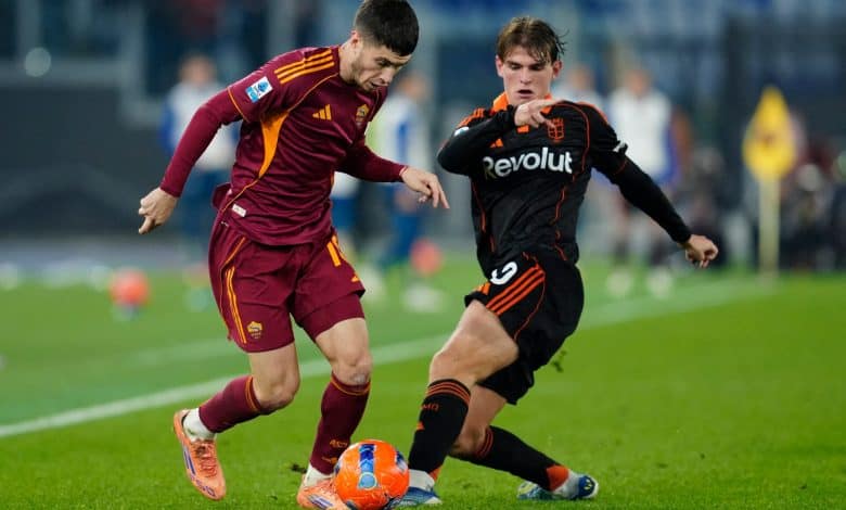 Athletes battling for ball during match.