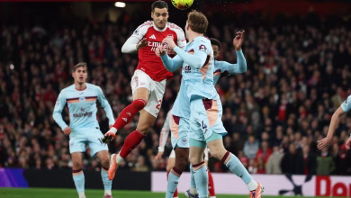 Arsenal stay in control of title race