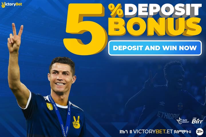 A promotional banner from VictoryBet.et featuring a smiling soccer player with a victory sign, advertising a 5% deposit bonus with a call to action to deposit and win now.