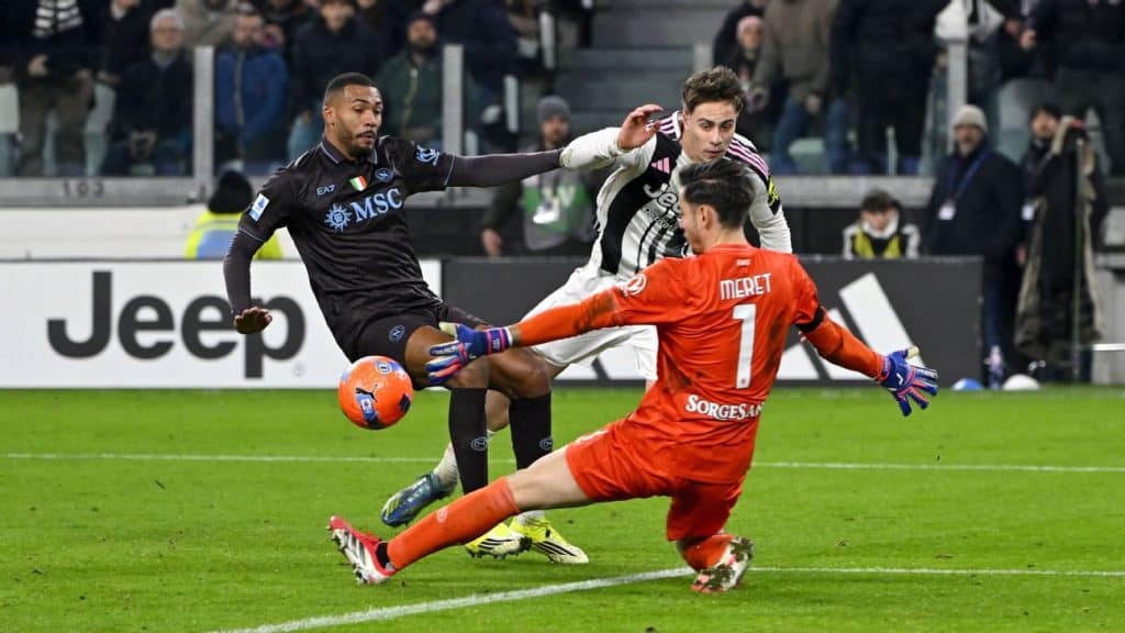 Professionals competing during a soccer match, emphasizing action and athleticism in sports.