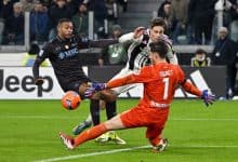 Professionals competing during a soccer match, emphasizing action and athleticism in sports.