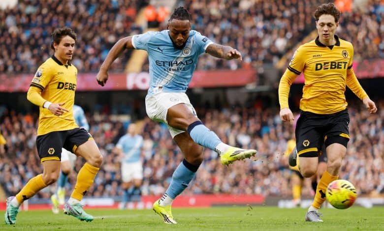 Male soccer players competing during a match, wearing team jerseys, focusing on the ball and showcasing athletic skills on the field.
